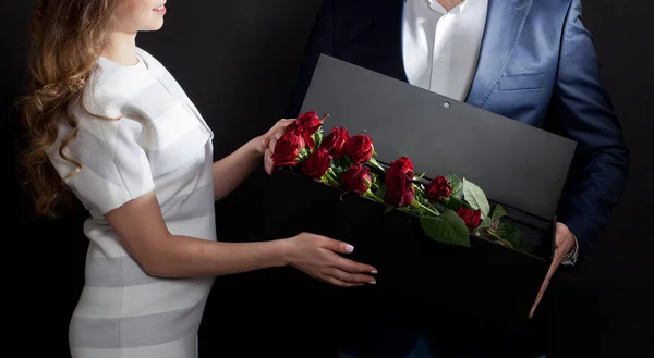 Man Gives Red Roses Original Box His Beloved Woman — Stock Photo, Image