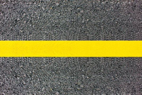 Texture de la route ligne jaune . — Photo