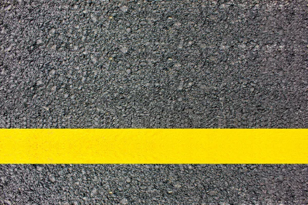 Weg textuur gele lijn. — Stockfoto