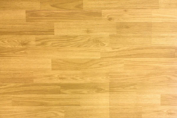 Hardwood maple basketball court floor viewed from above.