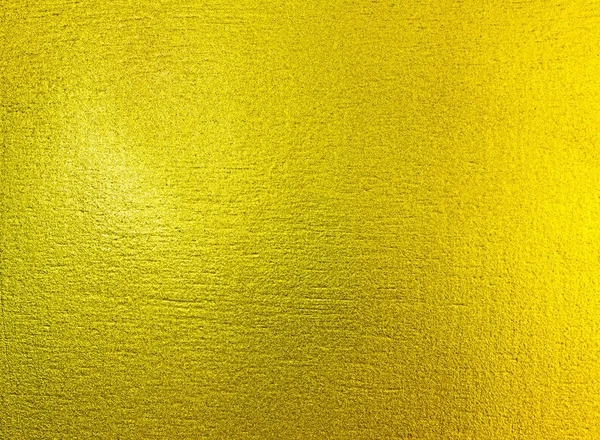 Błyszczący żółty liść złota folia tekstura tło. — Zdjęcie stockowe