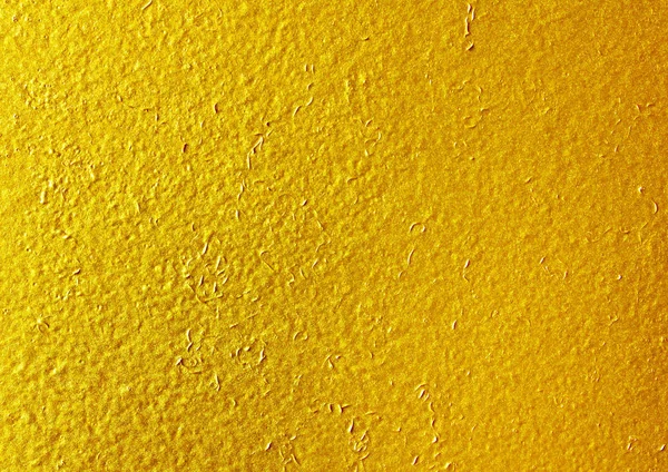 Błyszczący żółty liść złota folia tekstura tło. — Zdjęcie stockowe
