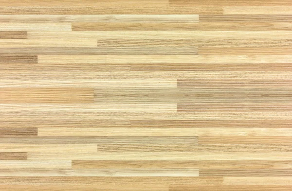 Hardwood maple basketball court floor viewed from above.