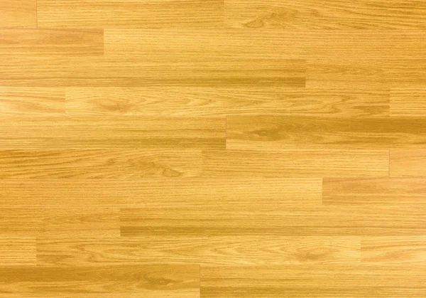 Hardwood maple basketball court floor viewed from above.