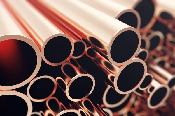 Industry business production and heavy metallurgical industrial products, many shiny steel pipes, industrial background, manufacturing business production concept, copper pipes with selective focus — Stock Photo, Image