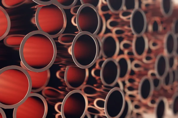 Industry business production and heavy metallurgical industrial products, many shiny steel pipes, industrial background, manufacturing business production concept, copper pipes with selective focus — Stock Photo, Image