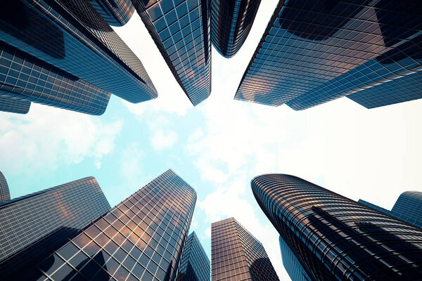 Low angle view of skyscrapers. Skyscrapers at sunset looking up perspective. Bottom view of modern skyscrapers in business district in evening light at sunset. Business concept of success industry tec