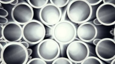 Metal borular yığılmış. Seçici odak etkisi ile parlak metal çelik borular yığını. 3D animasyon 4k