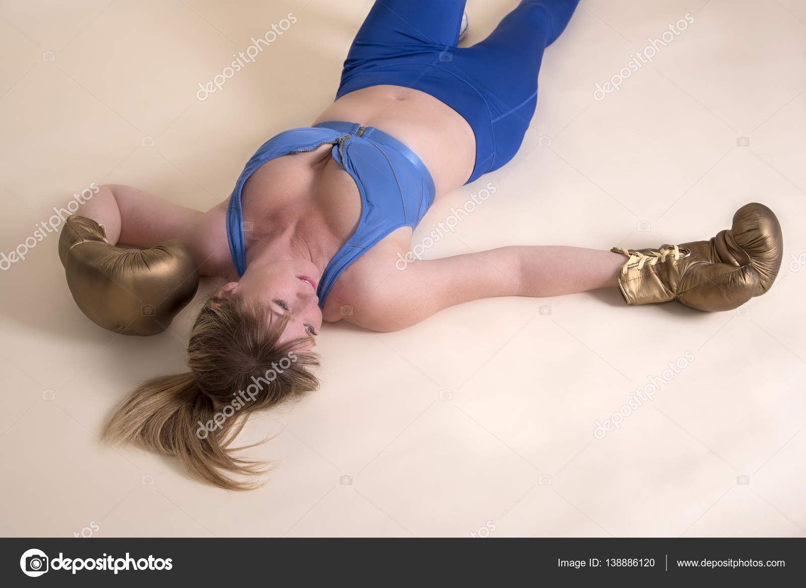 Female Boxer Laying On The Floor Stock Photo Image By C Petertt