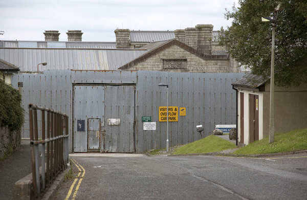 Metal fence around Dartmoor Prison England UK