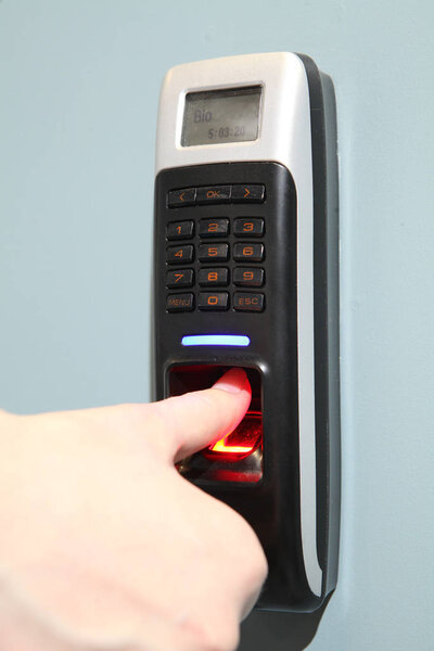 Finger scan security for entry server room. An Fingerprint machi
