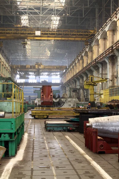 Industrial production of turbines for heavy industry. Huge steel turbine components. Industrial. Manufacture of water turbines. The huge machine turbine production. Large parts of the plant.