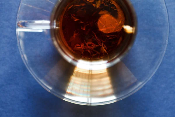 A cup of tea with marbles. Top view. — Stock Photo, Image