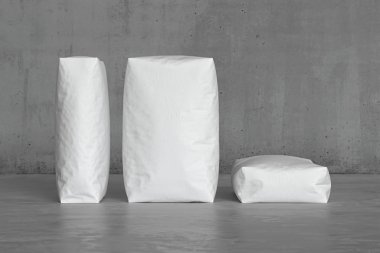 Beton zeminde beyaz çuvallar. 3d hazırlayıcı
