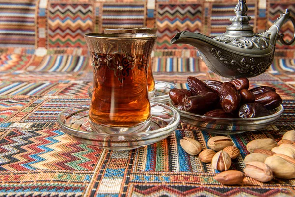 Sweets, dates and tea — Stock Photo, Image