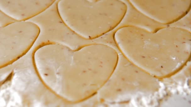 Heart cut out of the dough — Stock Video