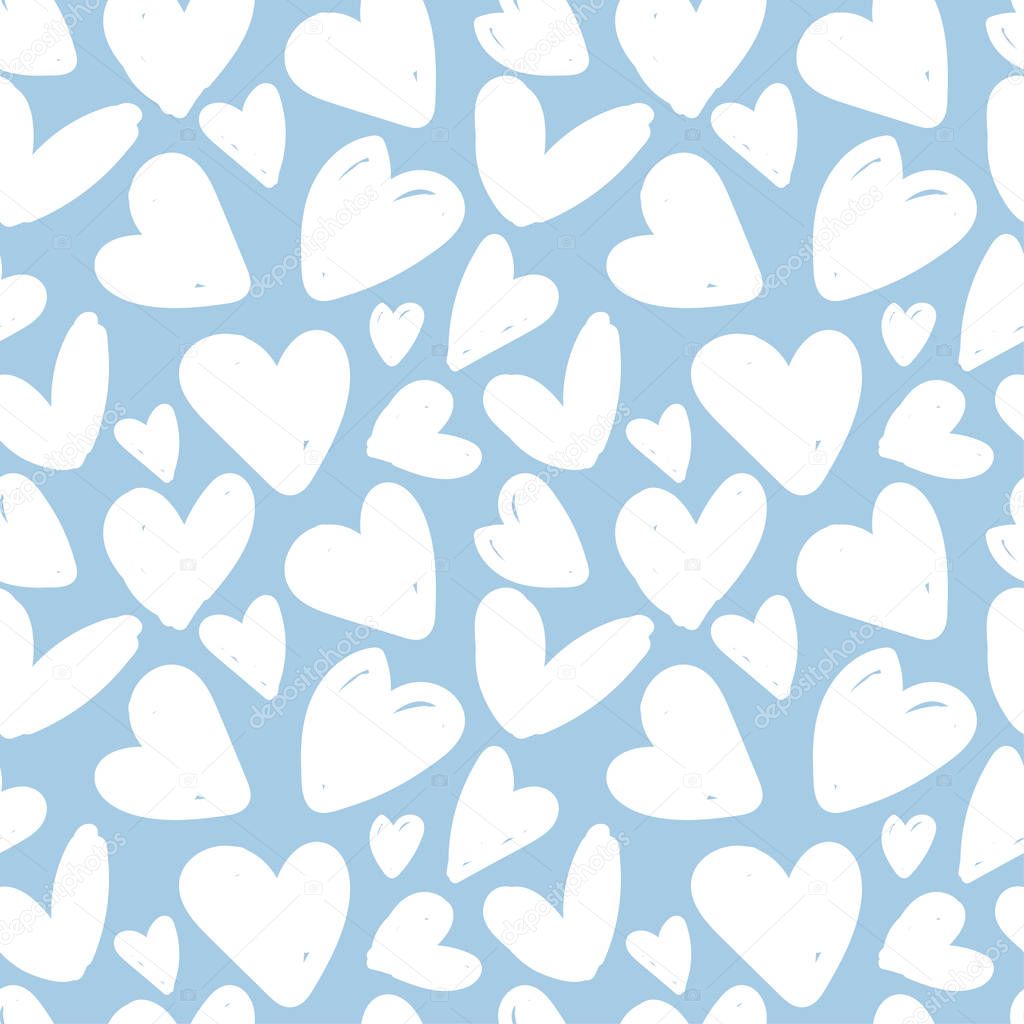 Seamless pattern with white hearts on a blue background