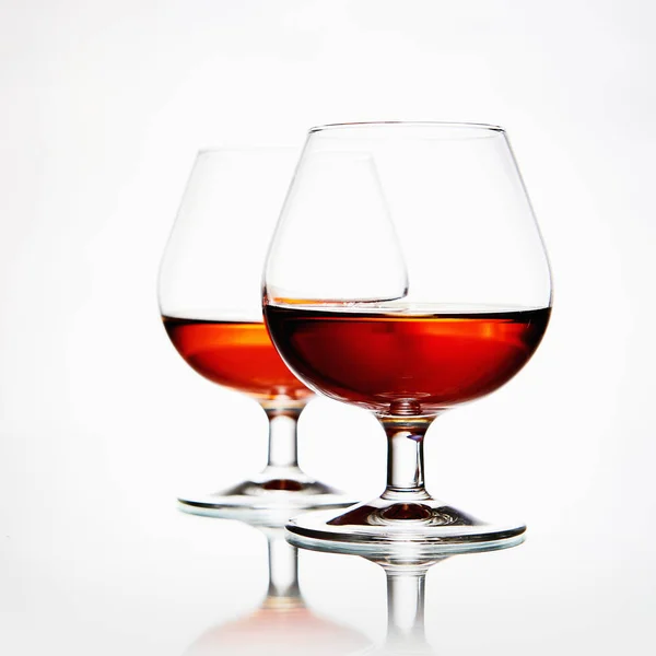 Couple glasses with cognac — Stock Photo, Image