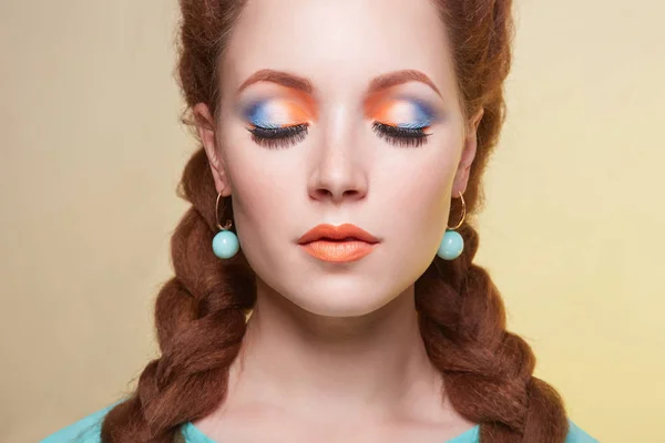 Beautiful woman with colorful make-up — Stock Photo, Image