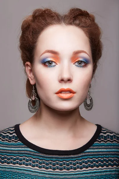 Beautiful woman with colorful make-up — Stock Photo, Image