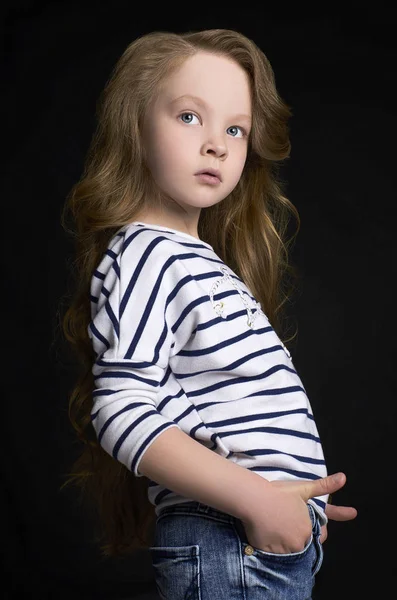 Fashion child model in jeans — Stock Photo, Image