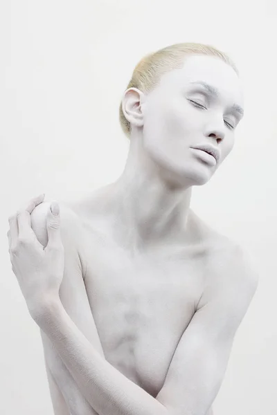 Beautiful naked woman in white paint — Stock Photo, Image