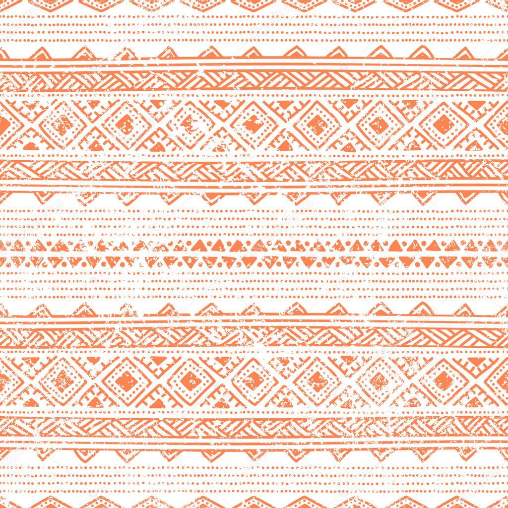 Seamless ethnic pattern. Tribal motifs. Grunge texture. Orange a