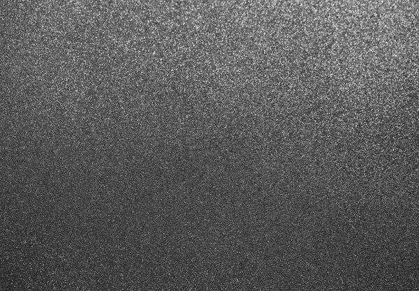 Grey texture. Macro shoot of non-stick surface of frying pan