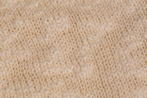 Macro imagem de cor de textura de malha bege . — Fotografia de Stock