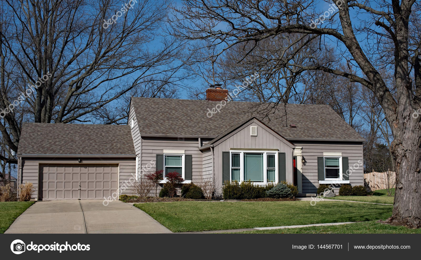 Ranch House With Dormers Small Gray House With Garage Stock