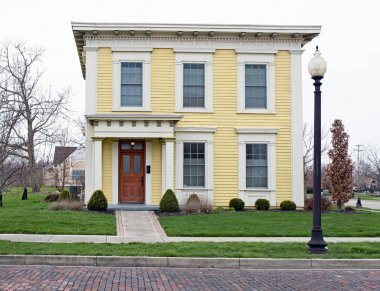 Old Yellow Italianate Square House Front clipart