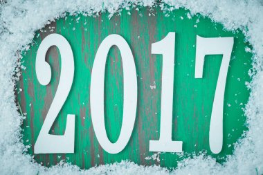 2017 yılbaşı sayılarla, kar çerçeve arka plan.