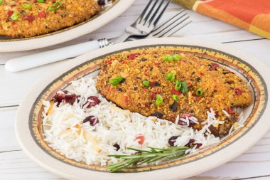 Kızılcık pirinç pişmiş tortilla kabuklu tilapia.