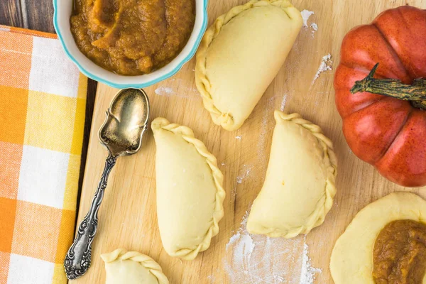 Unbaked pumpkin pie bites.