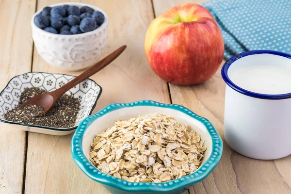 Overnight oats with chia seeds, blueberries and apple.