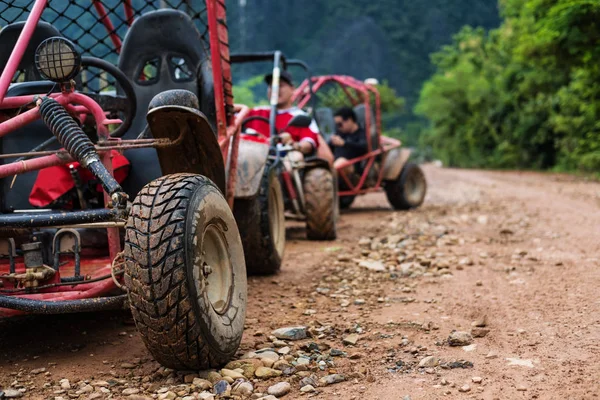 Off road buggy on country road — Stock Photo, Image