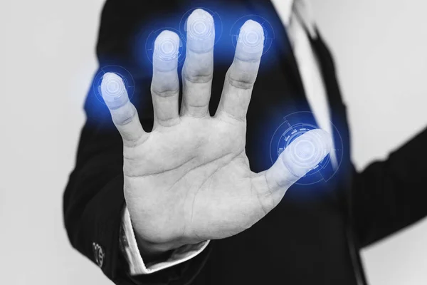ビジネスマンは、指紋をバイオ メトリックの id 承認画面にスキャンします。ネットワーク セキュリティ システムのコンセプト — ストック写真