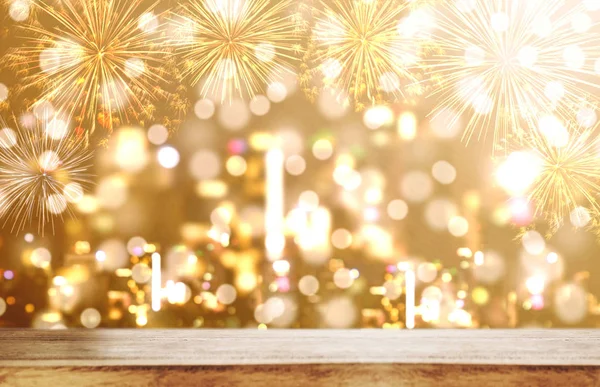 Luxury background, Wooden desk with Luxury gold Bokeh light with fireworks background