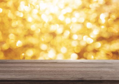 Soyut lüks altın Bokeh ışık ile ahşap masa üstü arka planı için