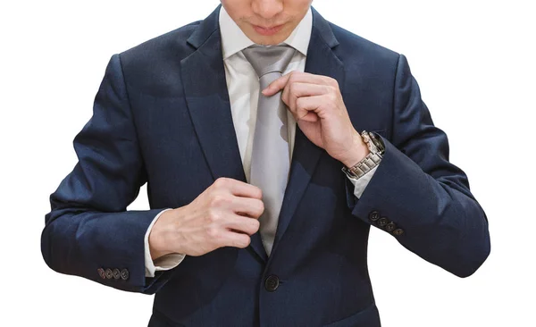 Joven Hombre Negocios Traje Azul Tocando Corbata Aislado Sobre Fondo — Foto de Stock