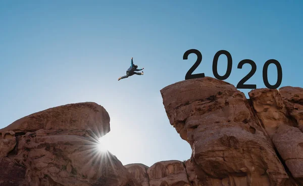 Silhouette Man Jumping Cliff 2020 New Year 2020 Challenge Concept — Stock Photo, Image