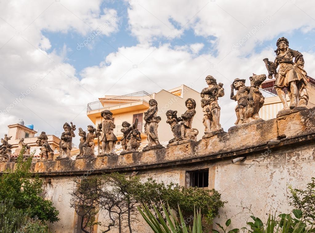This is famous grotesque statues with human faces that decorate garden and wall of Villa Palagonia