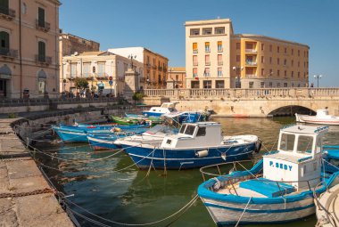 Fishing boats in the city of Syracuse, Sicily clipart