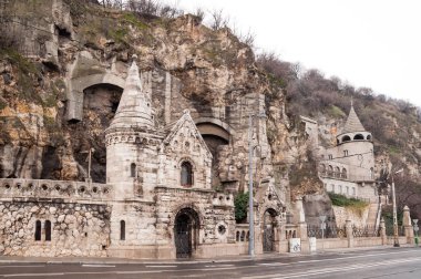 Facade of the Cave Church located inside Gellert Hill in Budapest clipart