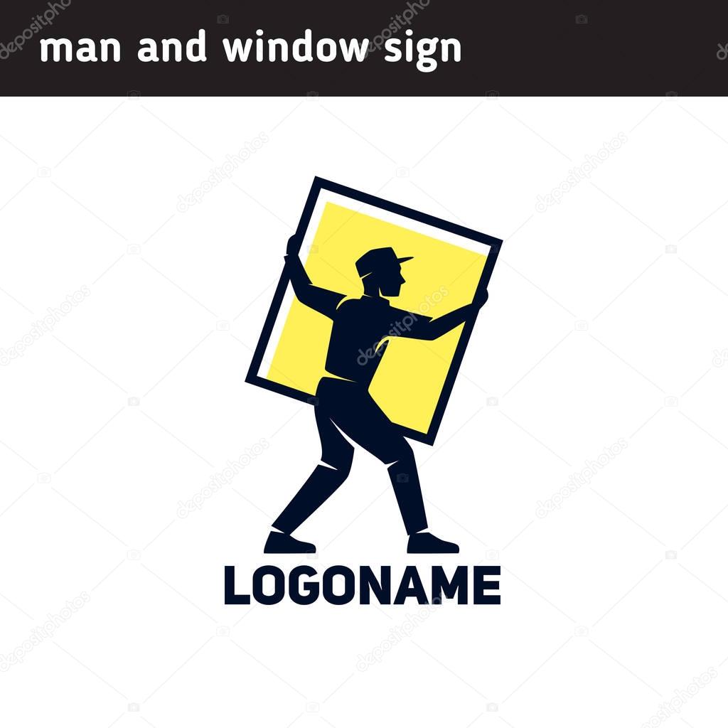 Sign worker installs a window frame