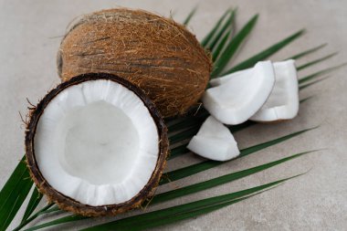 image of coconuts , whole and half , 