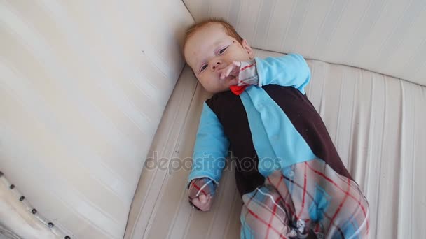 Very happy laughing baby lying — Stock Video