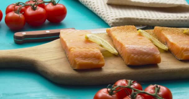 Cooking concept. Seasoning falling onto Salmon fish — Stock Video