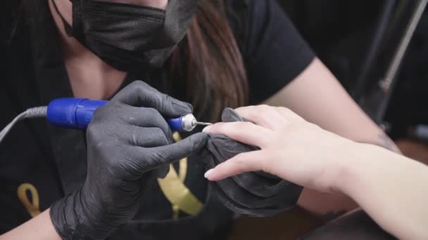 Closeup slow motion shot of hardware manicure in a beauty salon — Stock Video