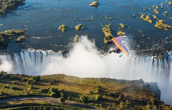 Flyings on hang glider under Victoria Falls